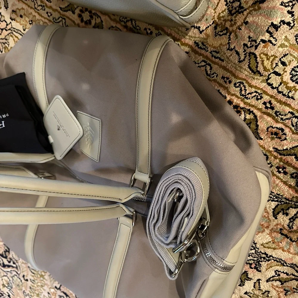 Exclusive Four seasons private jet experience duffel and toiletry kit.  BNWT